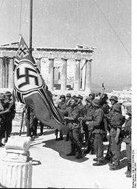 German troops unfurl the Swastika on the Acropolis - the Italian flag was also apparently flown. 